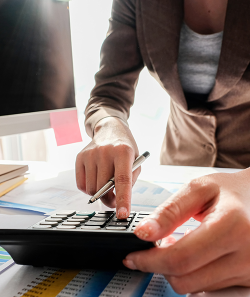 Businessman Accounting Counting with calculator and financial document report at home.